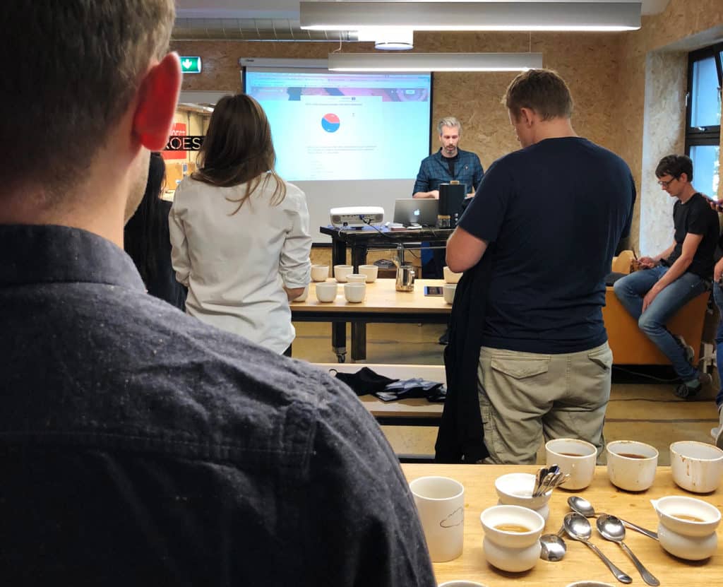 Geoff delivering presentation in Tim Wendelboe's workshop