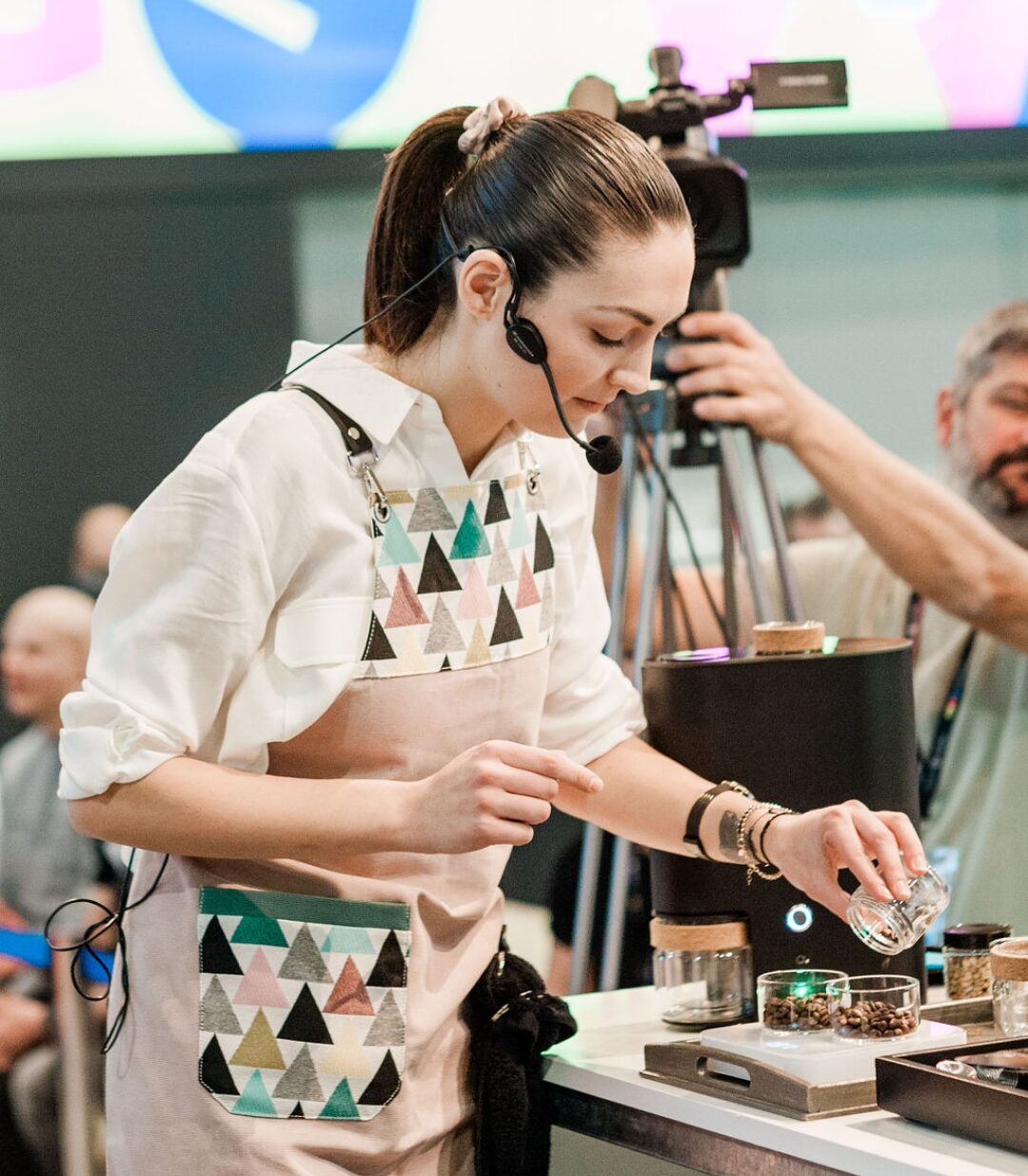 Irini Daskalopoulou competing in 2021 World Barista Championship using IKAWA on stage